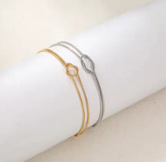 Knotted Gold and Silver Couple Bracelets